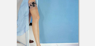 Model's Leg In Van Raalte Stockings Постер 91 x 122 см