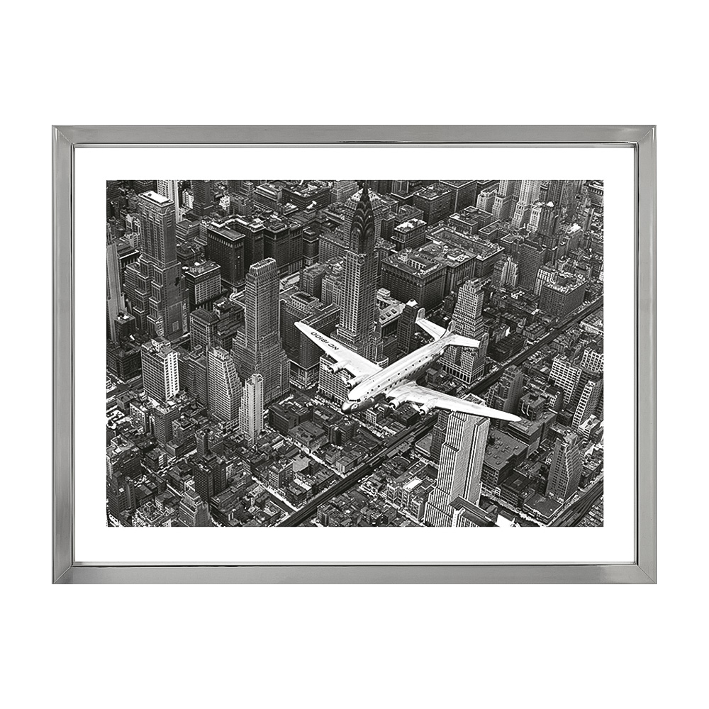 

DC-4 Over Manhattan Постер