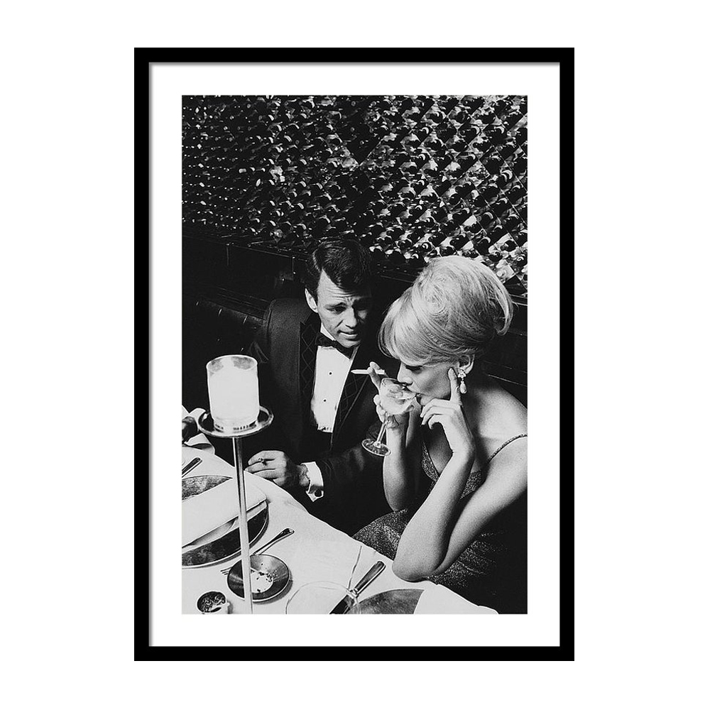 

Glamorous 1960s Couple Dining Постер