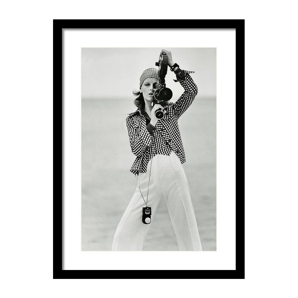 

Model Looking Through a Beaulieu Camera Wearing Постер