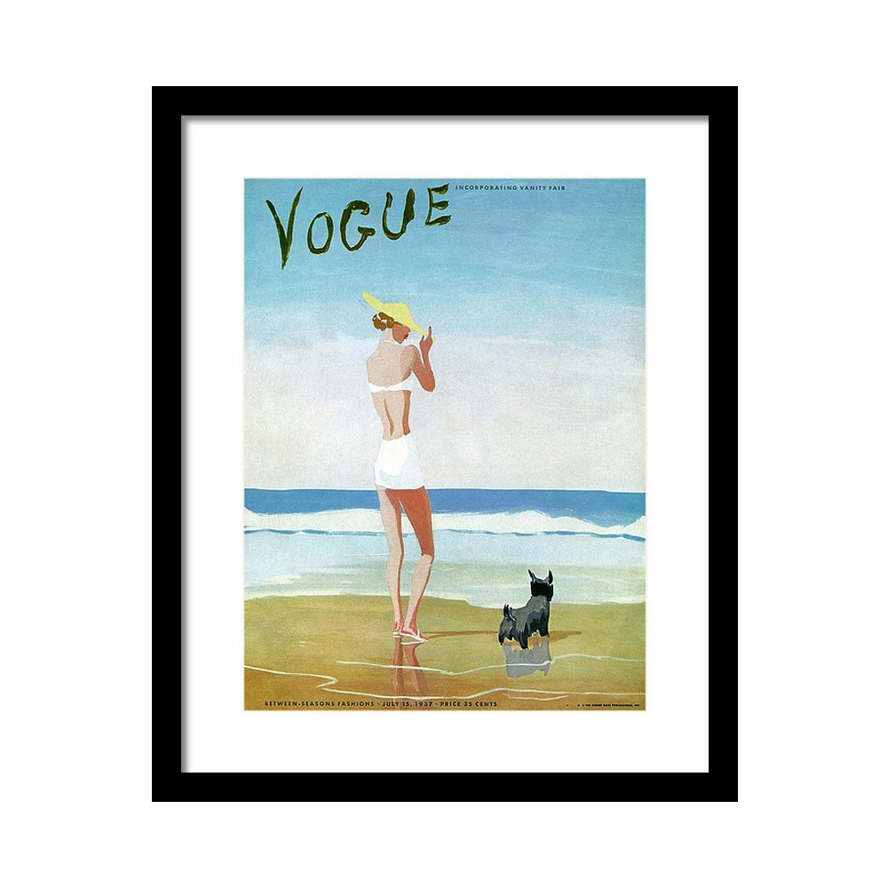 

Vogue Magazine Cover Featuring a Woman on a Beach Постер