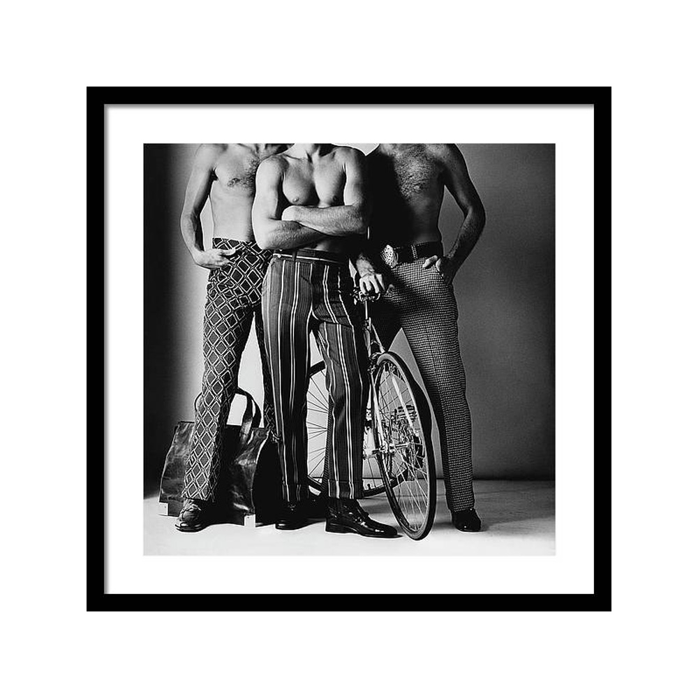 

Three Male Models Wearing Patterned Trousers Постер